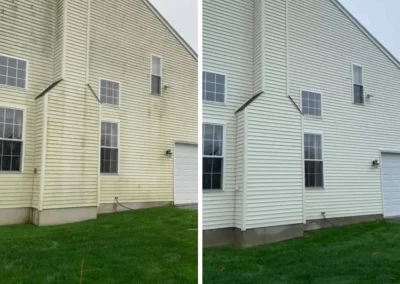 A house exterior before and after cleaning, showing dirty siding on the left and clean siding on the right.