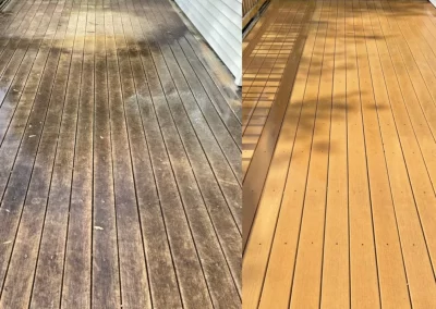 Side-by-side of a wooden deck: left side dirty and weathered, right side clean and freshly refinished.
