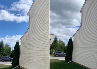 Side-by-side photo shows a house before and after its siding is cleaned, with a car and trees in the background.