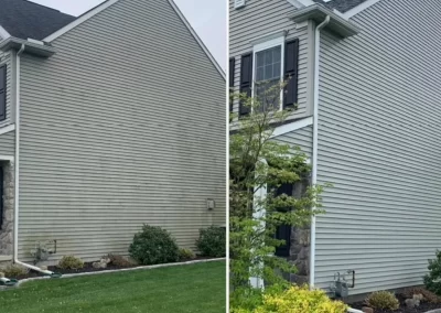 Side-by-side of a house before and after power washing, showing cleaner, brighter siding on the right.