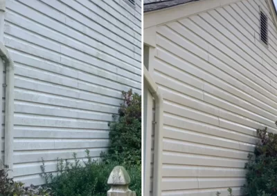 Side-by-side of a house’s siding before (dirty) and after (clean) power washing, with bushes in front.
